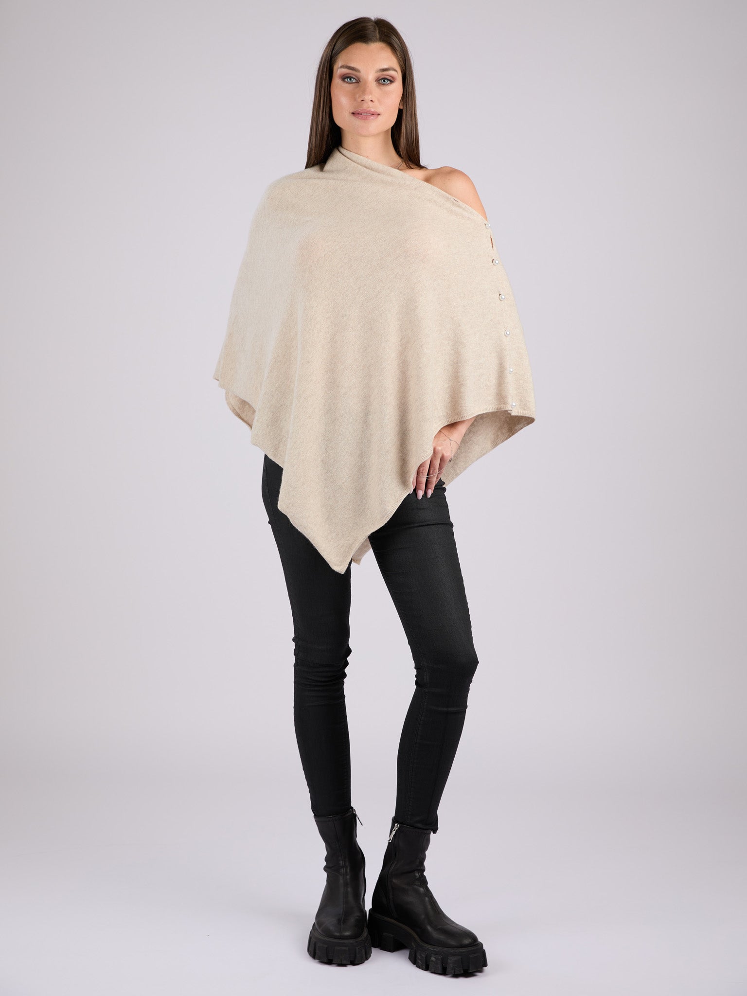 Cashmere knit poncho with  decorative pearl buttons along one edge #LATTE