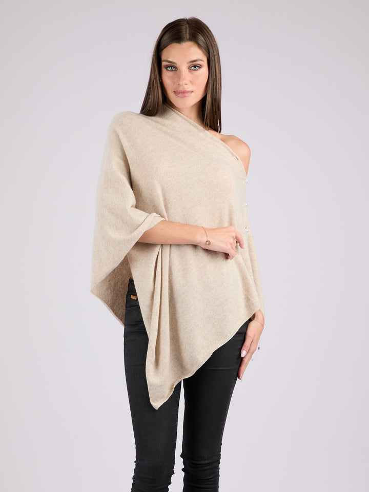 Cashmere knit poncho with  decorative pearl buttons along one edge #LATTE
