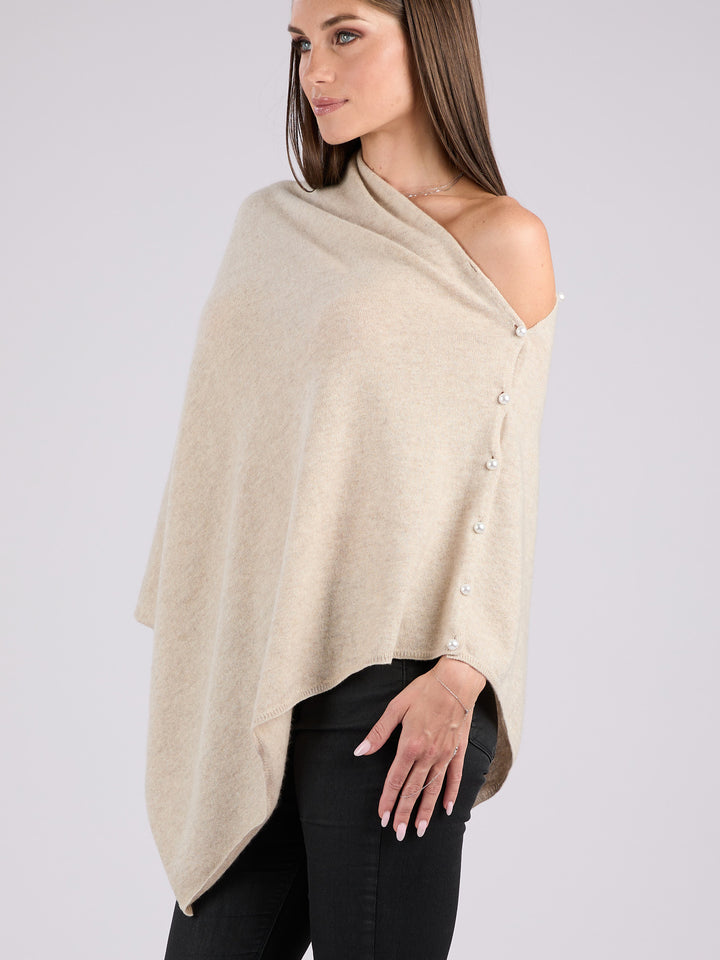 Cashmere knit poncho with  decorative pearl buttons along one edge #LATTE