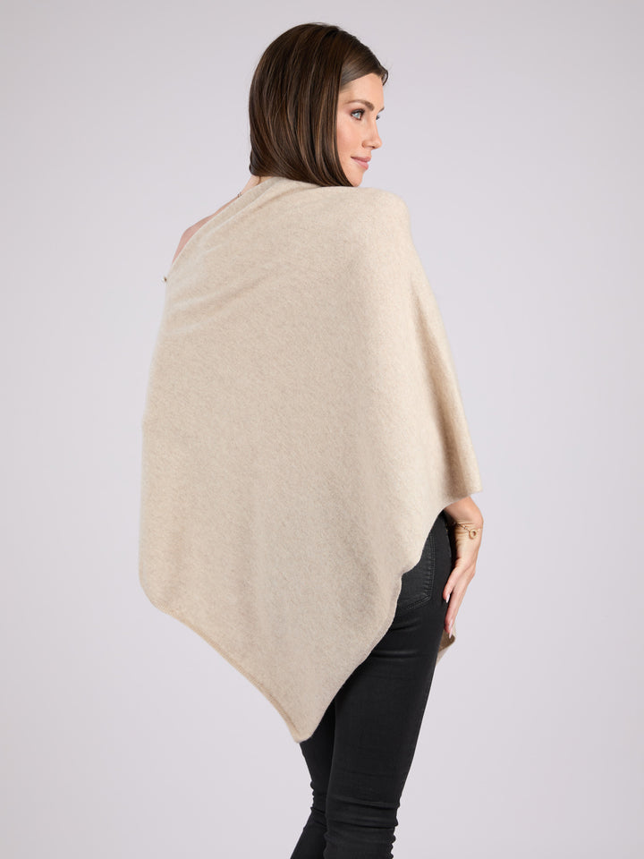 Cashmere knit poncho with  decorative pearl buttons along one edge #LATTE