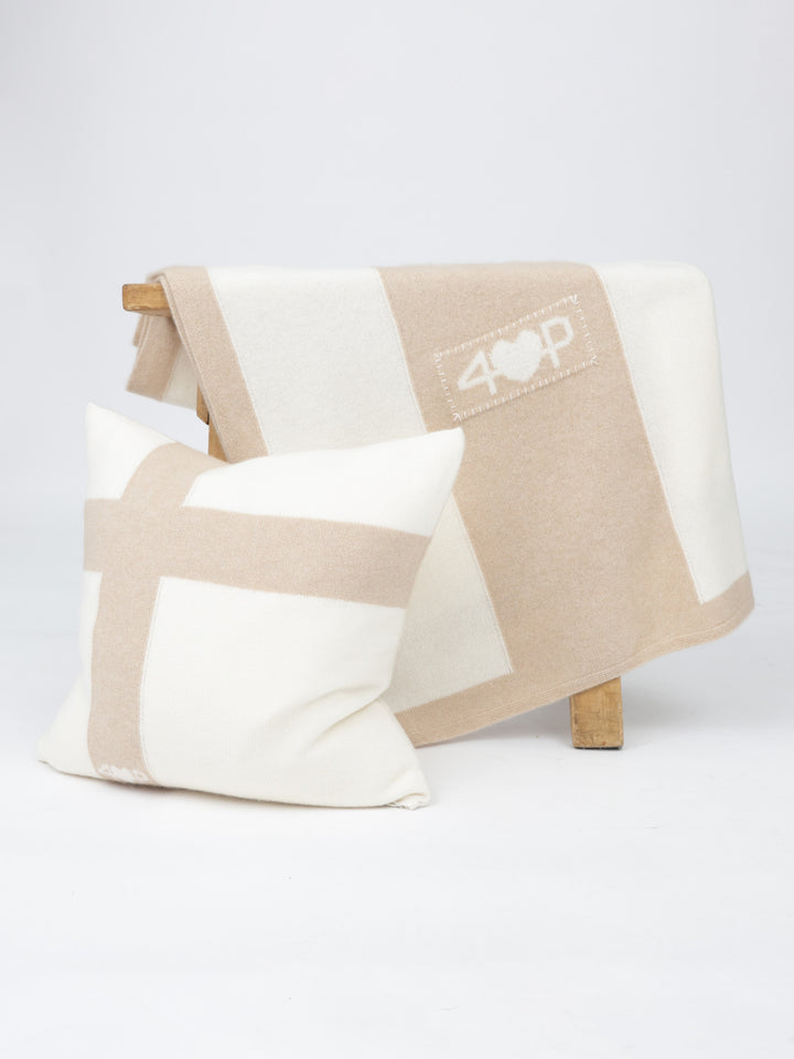 Organic undyed Mongolian cashmere blanket and pillow styled together