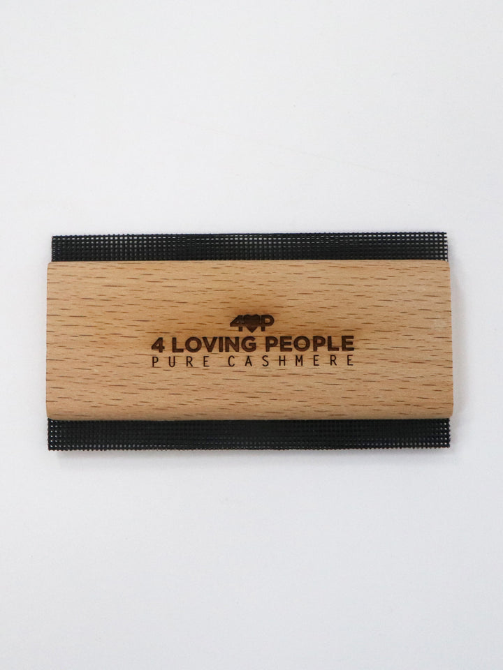 Cashmere comb used to de-pill a cashmere sweater